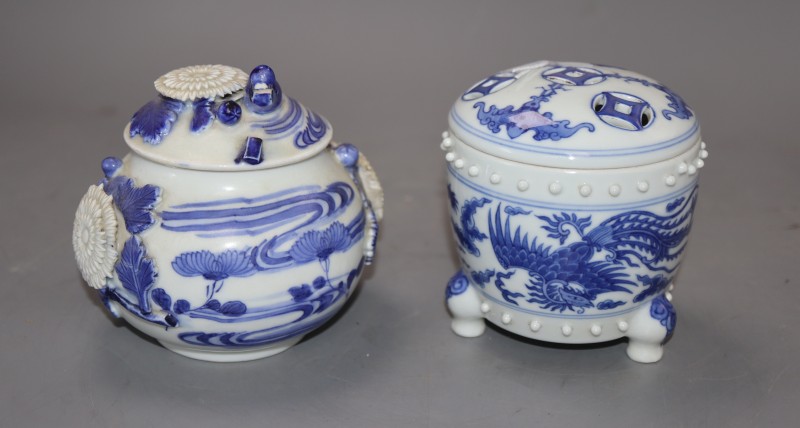 Two Chinese blue and white dragon jars and covers